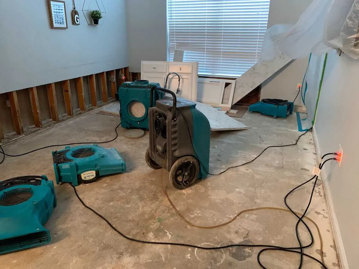 Dehumidifier in flood-cut room for Water Damage Restoration in Sunnyside